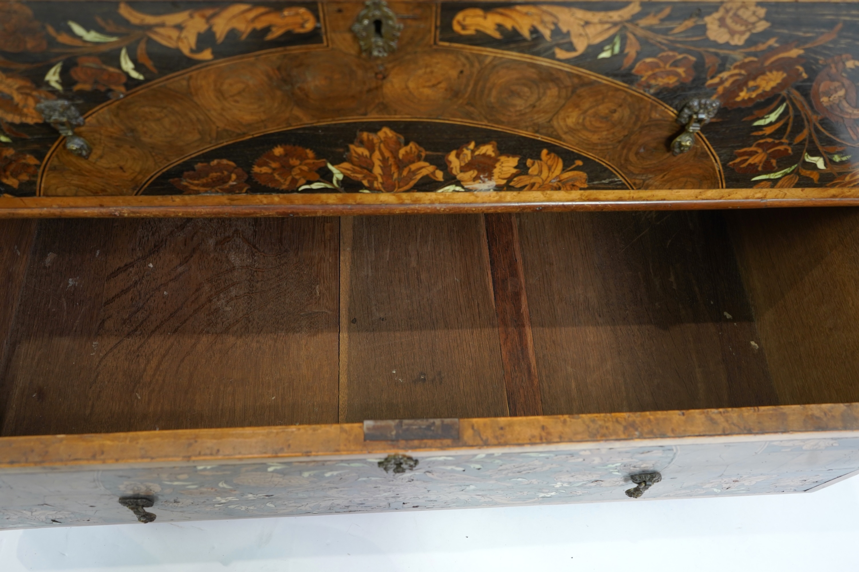 A William & Mary and later floral marquetry inlaid walnut chest